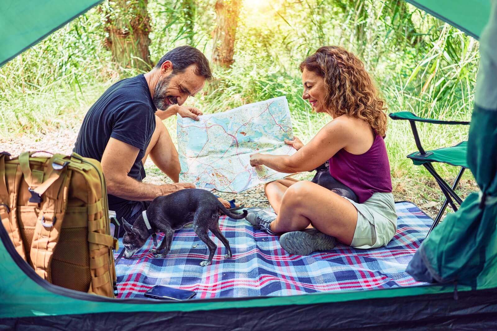 couple is having fun while camping