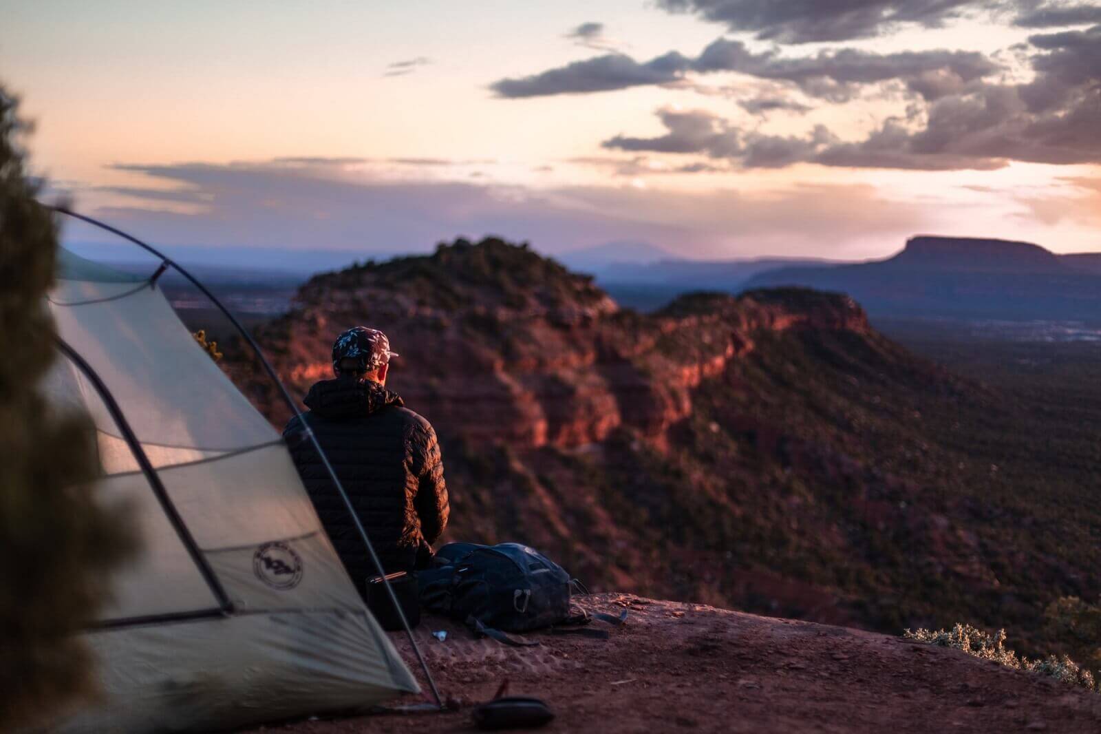 a man is camping solo
