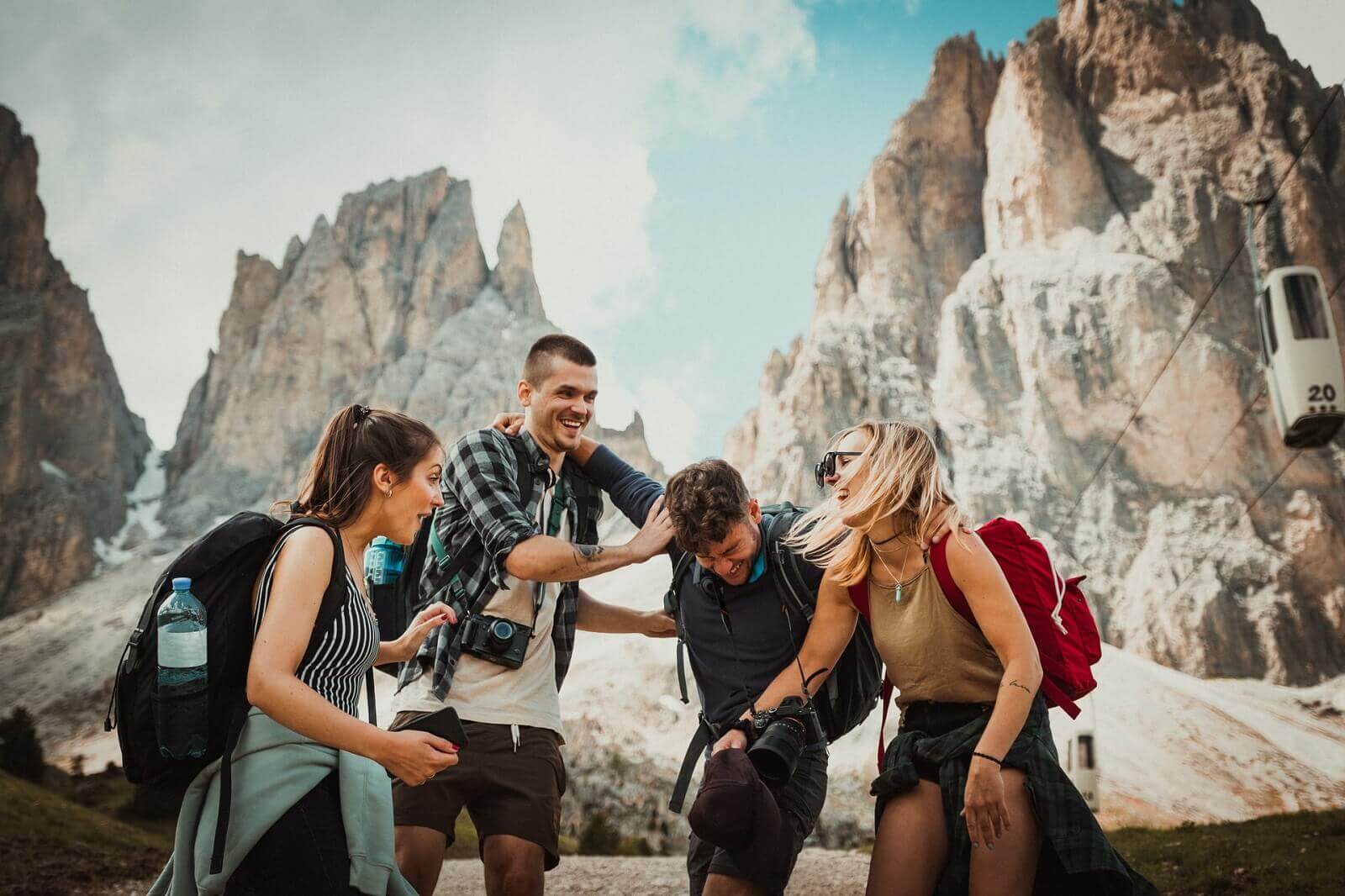 a group of friends hike in the wilderness