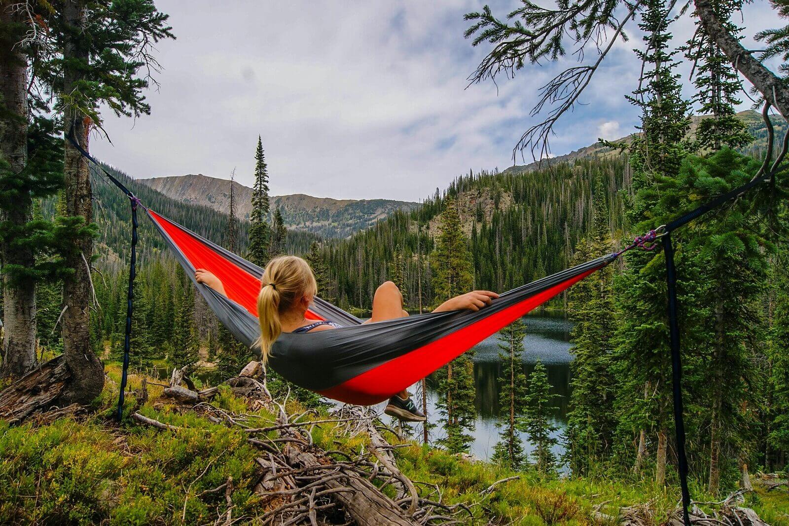 woman is relaxing in hammock